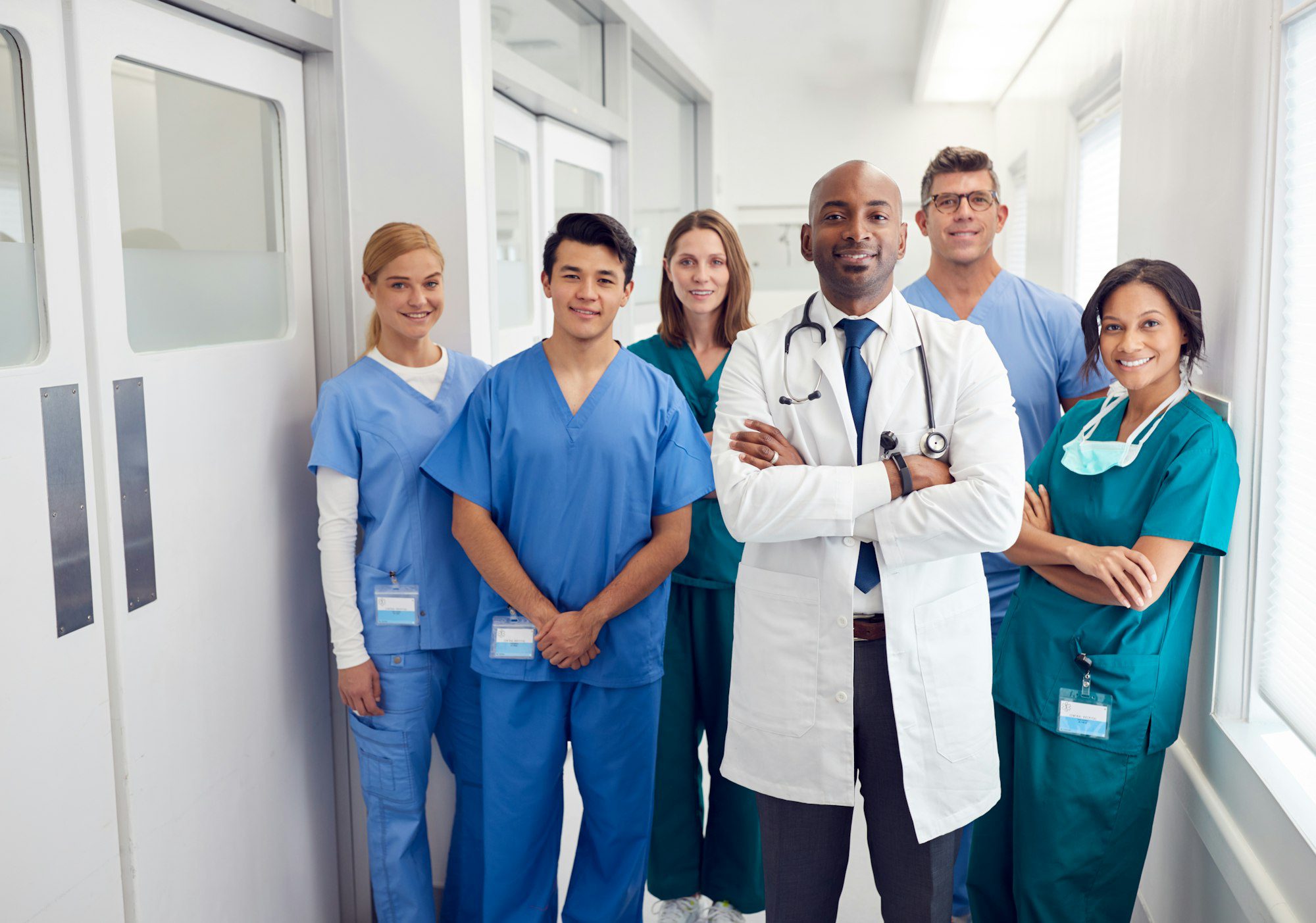 Home health professional or caregiver supporting a client with daily activities at home